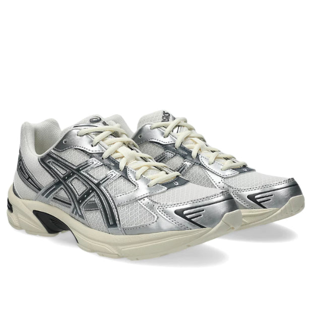 A pair of ASICS GEL-1130 Cream Carrier Grey trainers featuring warm cream mesh, cool grey overlays, signature ASICS stripes and a cushioned GEL sole on a clean white background.