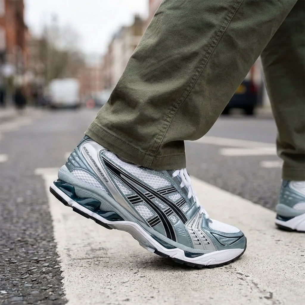 ASICS Gel-Kayano 14 White Fjord Grey on feet street style close-up with olive green trousers