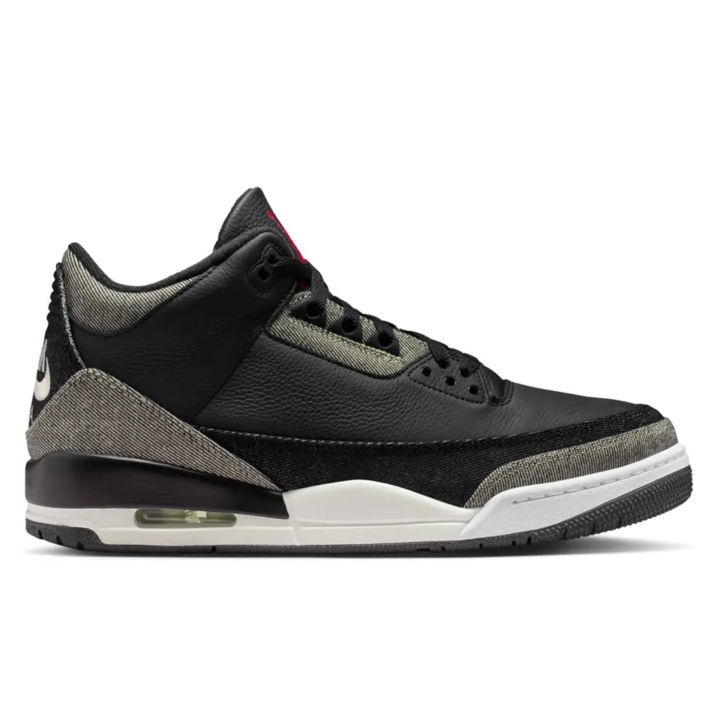 Air Jordan 3 Retro x Levi's Denim Black IR0914-400 lateral side profile showing the black tumbled leather midfoot panel, faded grey-olive washed denim on the toe cap and heel, red tongue tab, white Jumpman heel logo, and sail midsole with Air unit