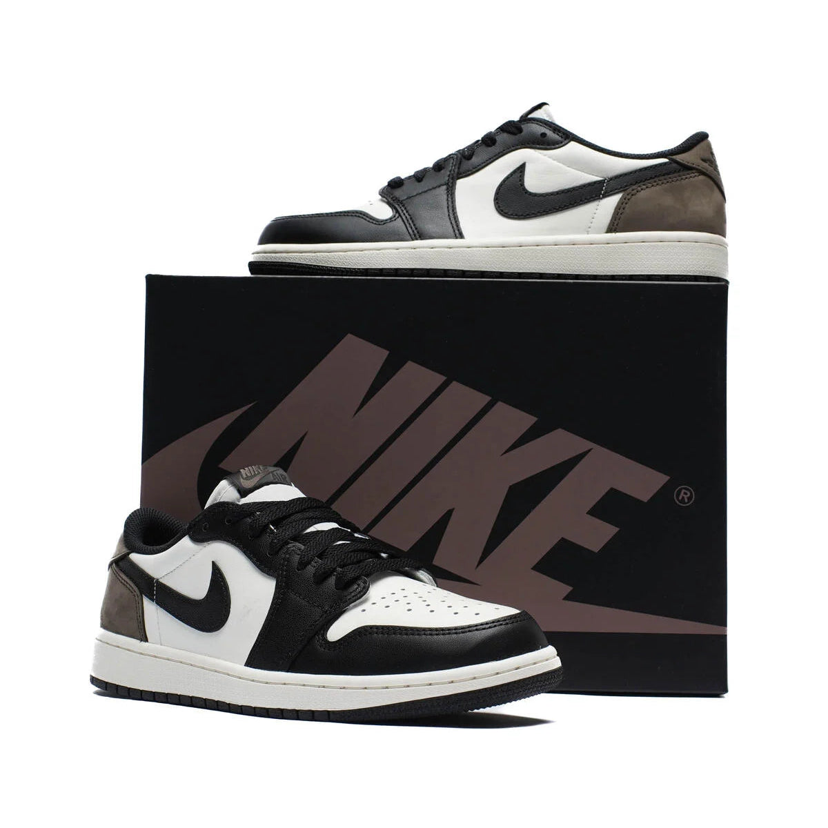 Air Jordan 1 Low OG Mocha pair displayed with black Nike box showing sail leather upper, black Swoosh, dark mocha nubuck heel, and sail midsole