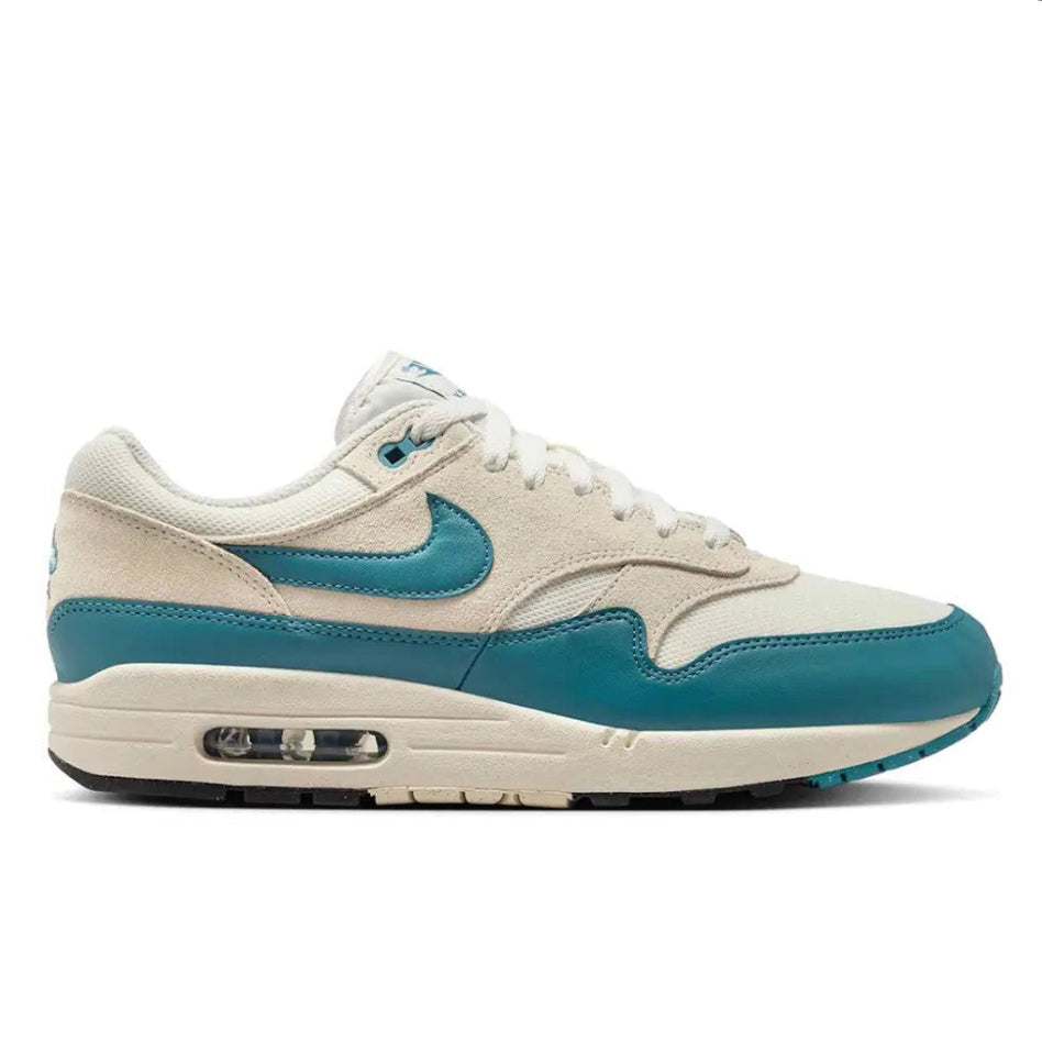 Nike Air Max 1 Soft Pearl Smokey Blue lateral side profile showing suede upper, teal Swoosh and visible Air unit