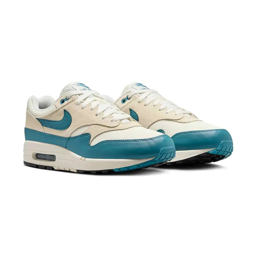 Nike Air Max 1 Soft Pearl Smokey Blue pair front three-quarter view showing smokey blue mudguard and pearl suede panels