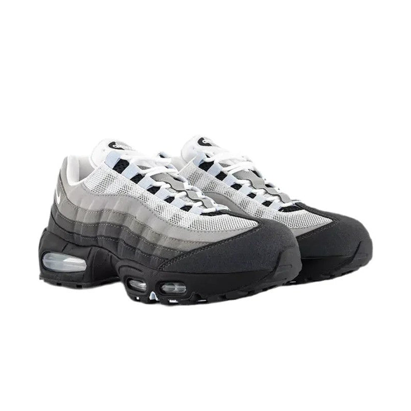 Nike Air Max 95 OG Blue Tint pair front three-quarter view showing layered suede and mesh upper
