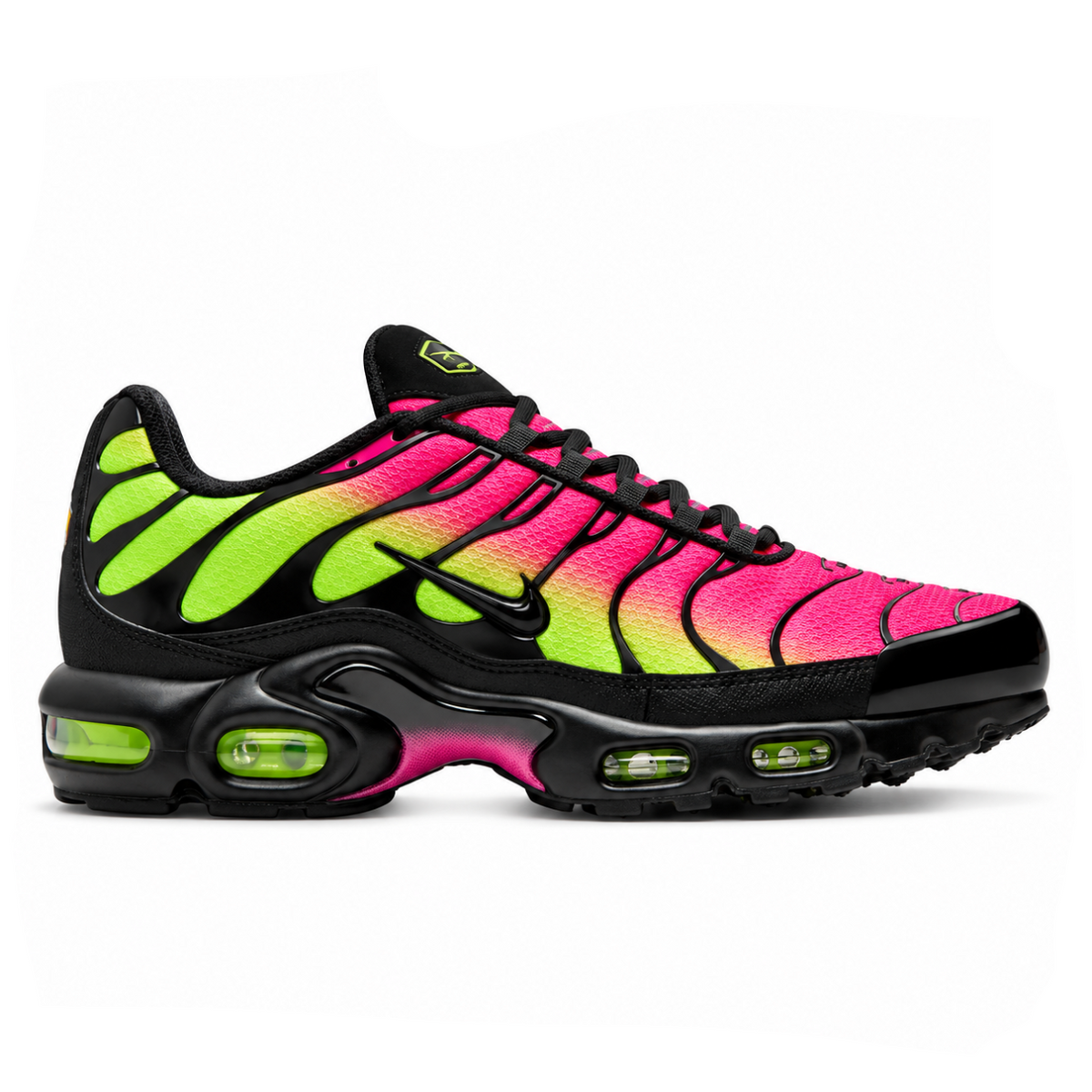 A side view of the Nike Air Max Plus TN Hyper Pink Volt trainer, showing the Hyper Pink and Volt gradient upper, glossy black TPU cage, black Nike Swoosh and sculpted Tuned Air sole.