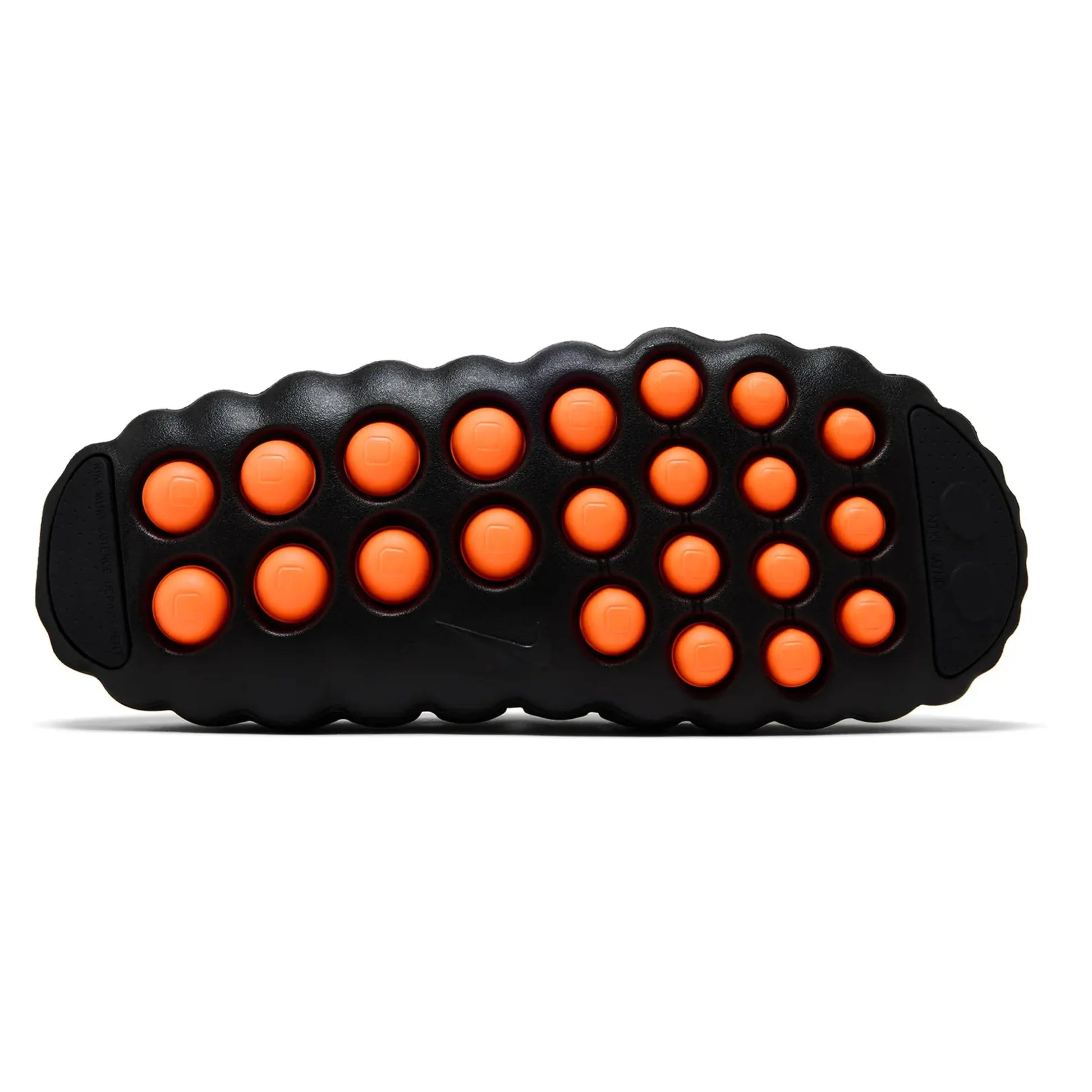 Nike Mind 001 Black - full outsole view showing 22 orange sensory activation nodes arranged across black rubber sole with Nike Swoosh branding