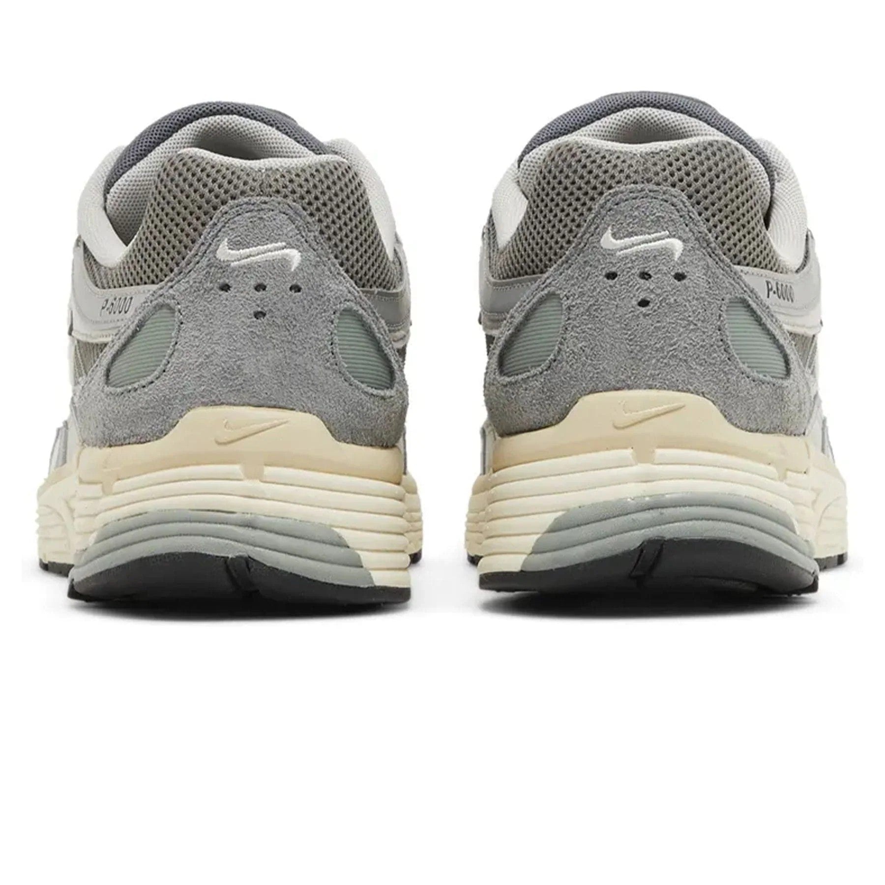 Nike P-6000 Flat Pewter rear view of pair on white background showing grey suede heel counter, white embroidered Swoosh, cream midsole, and P-6000 branding
