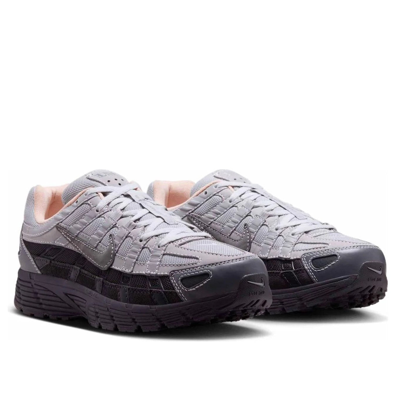 Nike P-6000 Smoke Grey Platinum Purple pair front view showing grey layered overlays peach inner lining and dark purple midsole