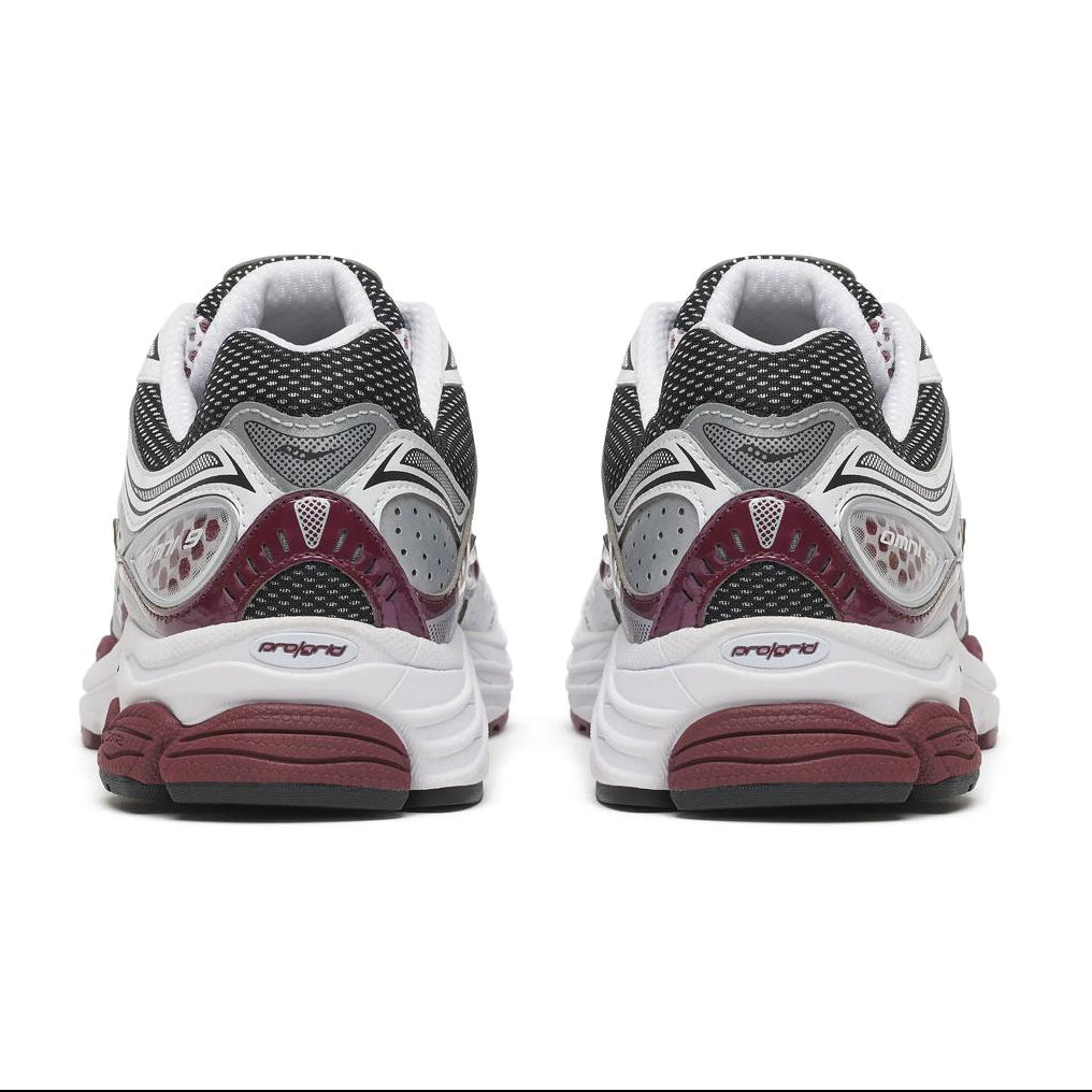 A rear view of the Saucony ProGrid Omni 9 White Maroon trainers, showing the structured heel, white and maroon colour palette and chunky cushioned sole on a clean white background.