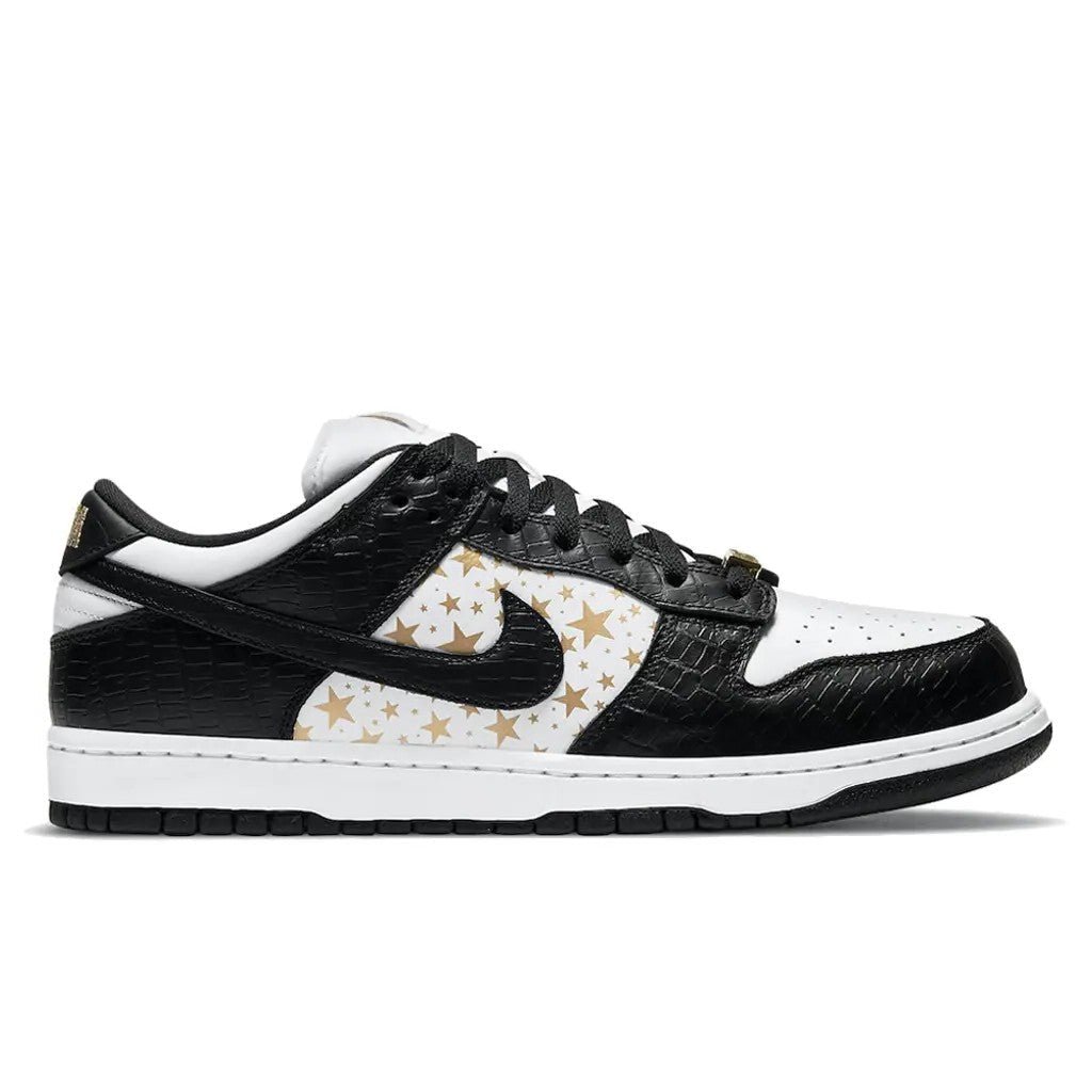 Supreme x Nike SB Dunk Low Stars Black pair front three-quarter view with World Famous hangtag and gold Supreme lace dubrae
