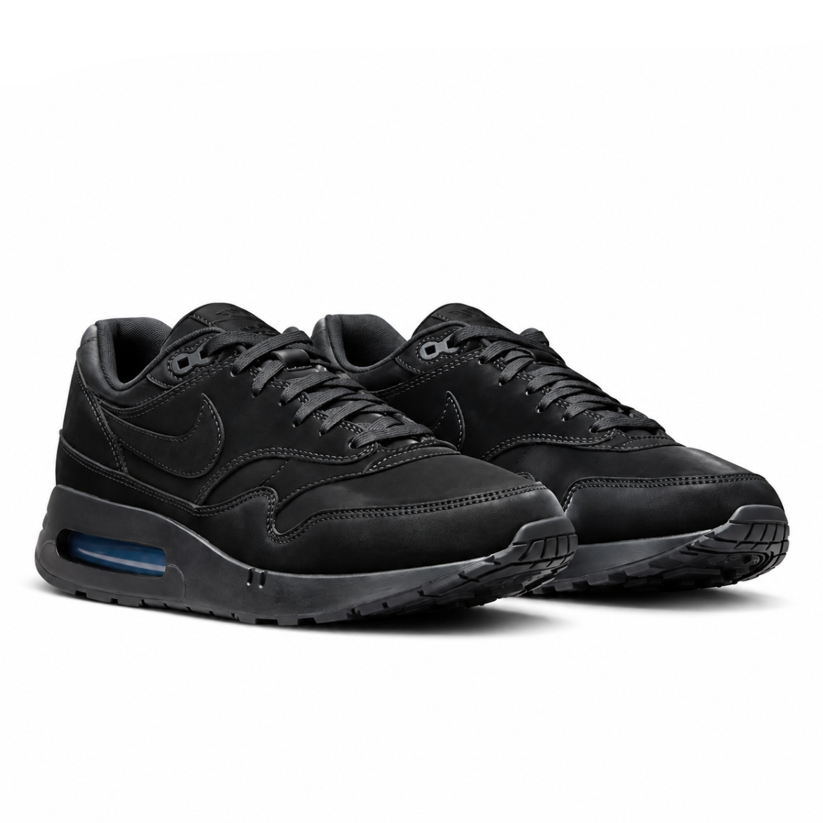A pair of Nike Air Max 1 Golf Black Cat trainers featuring an all-black leather and mesh upper with visible Nike Air cushioning on a clean white background.