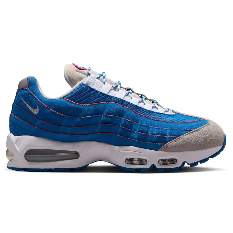 A side view of the Nike Air Max 95 Lawson Blue Sapphire trainer, showing the Blue Sapphire gradient panels, white mesh upper, suede detailing and classic Air Max sole.