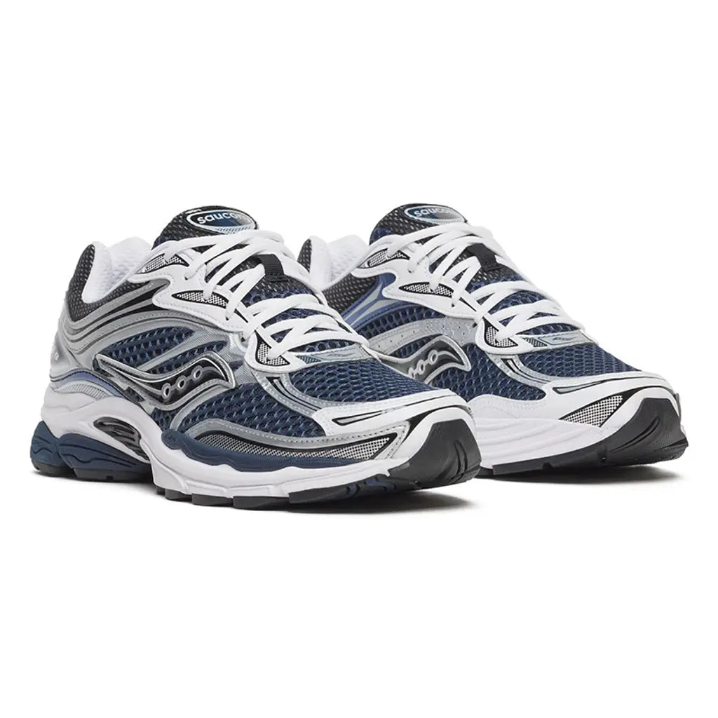 Front view of the Saucony ProGrid Omni 9 Deep Navy sneaker, highlighting the breathable dark blue mesh toe box and sporty synthetic overlays.