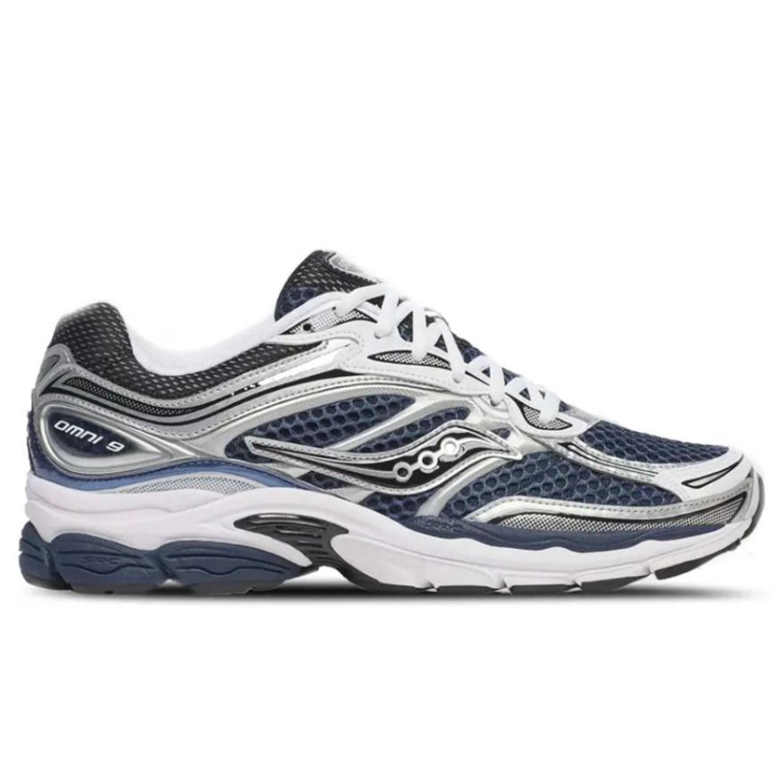 Side profile of the Saucony ProGrid Omni 9 S70739-41 in Deep Navy, showing the early 2000s technical lines, classic Saucony logo, and chunky retro midsole.