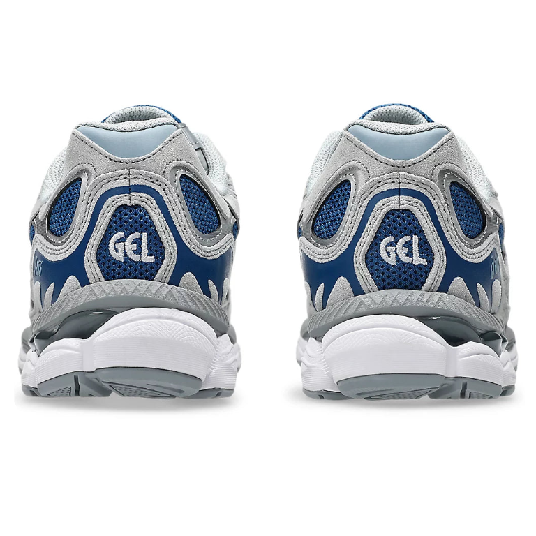 A rear view of the ASICS GEL-NYC Twilight Blue Gravel trainers, showing the structured grey heel, blue accents and sculpted cushioned sole on a clean white background.