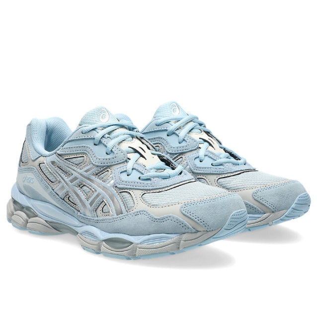 A pair of ASICS GEL-NYC Storm Cloud Pure Silver trainers featuring dark grey mesh, metallic silver overlays, signature ASICS stripes and a sculpted cushioned sole on a clean white background.