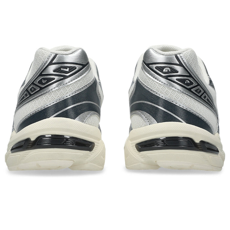 A rear view of the ASICS GEL-1130 Cream Carrier Grey trainers, showing the structured heel design, neutral cream and grey detailing, and cushioned sole on a clean white background.