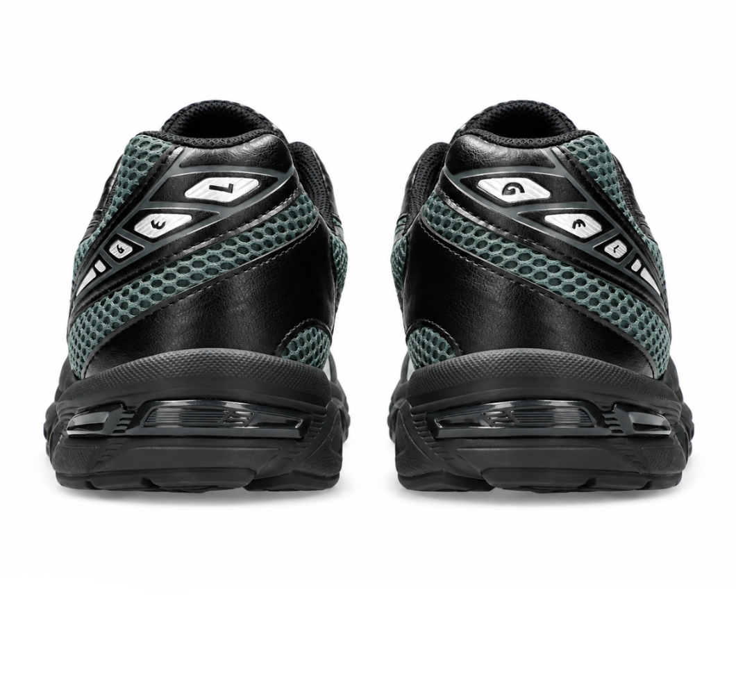 A rear view of the ASICS GEL-1130 Dusty Fern Black showing the structured heel, muted green finish and black detailing.