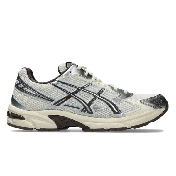 A side view of the ASICS GEL-1130 Cream Cocoa Powder trainer, showing the cream mesh upper, Cocoa Powder brown detailing, signature ASICS stripes and sculpted cushioned midsole.