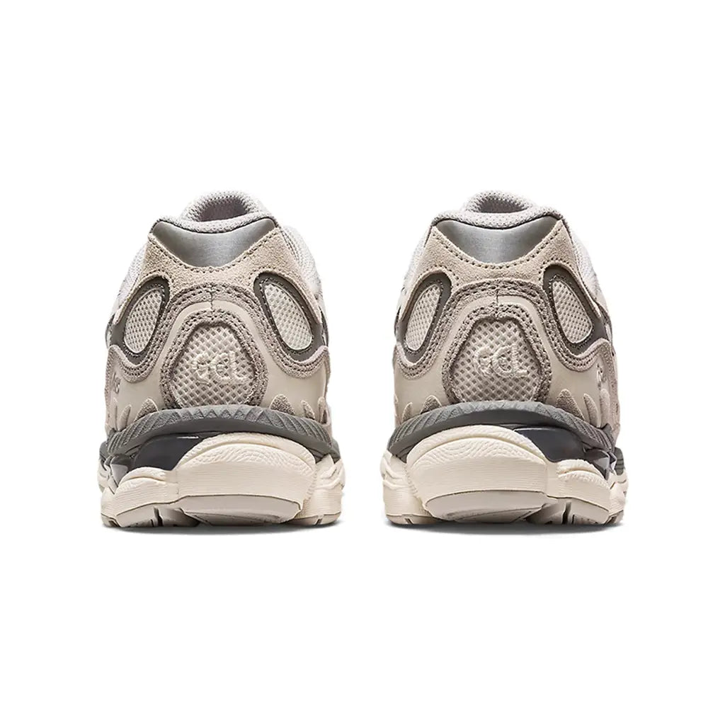ASICS GEL-NYC Cream Oyster Grey rear heel view of both shoes showing the tonal GEL branding on cream mesh, oyster grey suede heel panels, grey synthetic overlays, light grey collar lining, cream midsole with translucent grey GEL technology windows