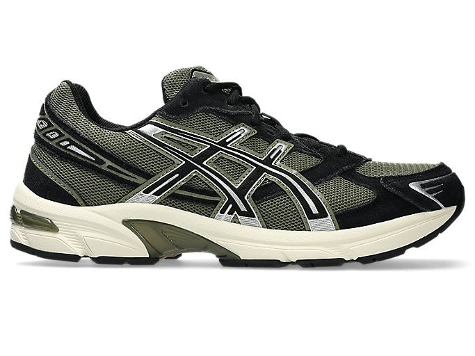ASICS Gel-1130 Irvine Black lateral side profile on white background showing olive green mesh upper, black suede overlays, silver ASICS stripes, and cream midsole with olive GEL accent
