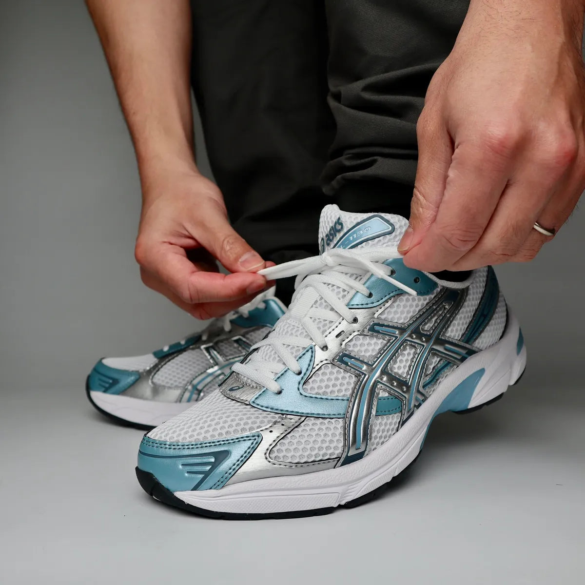 ASICS Gel-1130 Shark Skin on foot lacing up close-up
