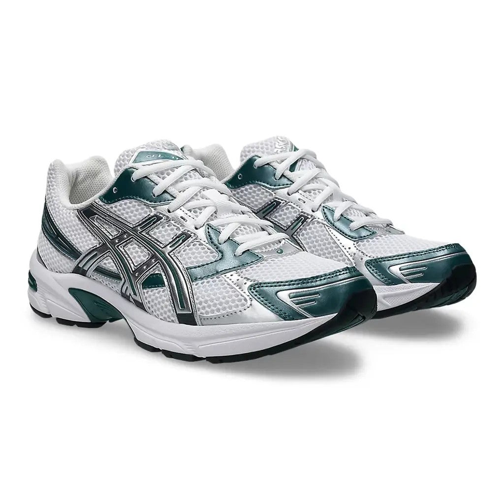 ASICS Gel-1130 White Dark Neptune pair front three-quarter view on white background showing silver ASICS stripes, green overlays, and green tongue branding