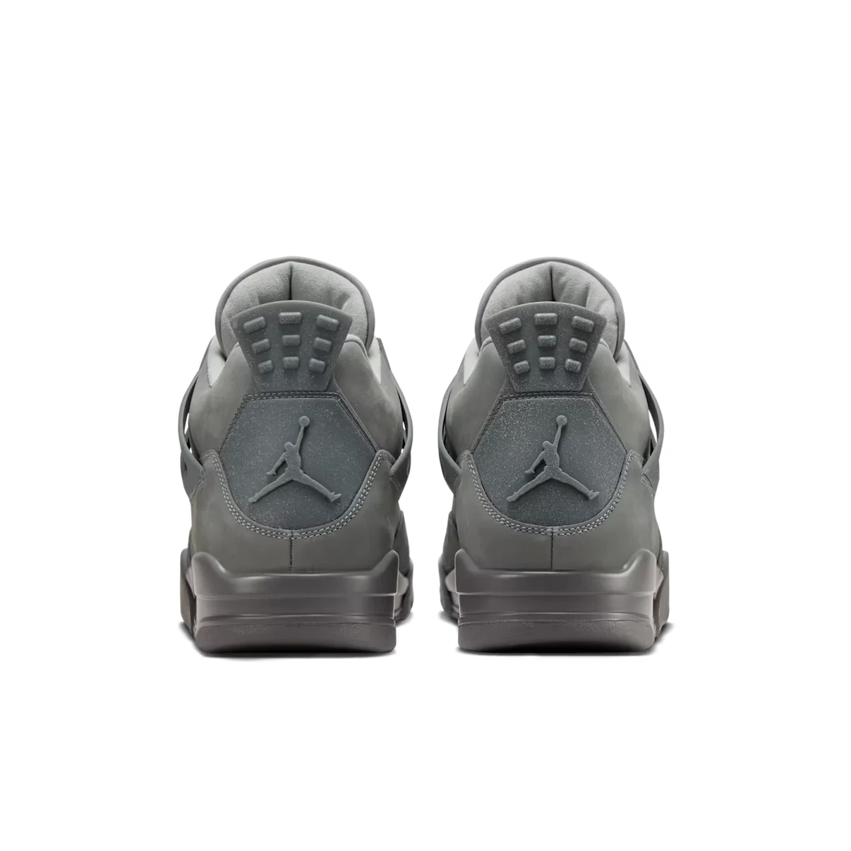 Air Jordan 4 Wet Cement heel view showing tonal grey Jumpman logo on heel tab and suede collar
