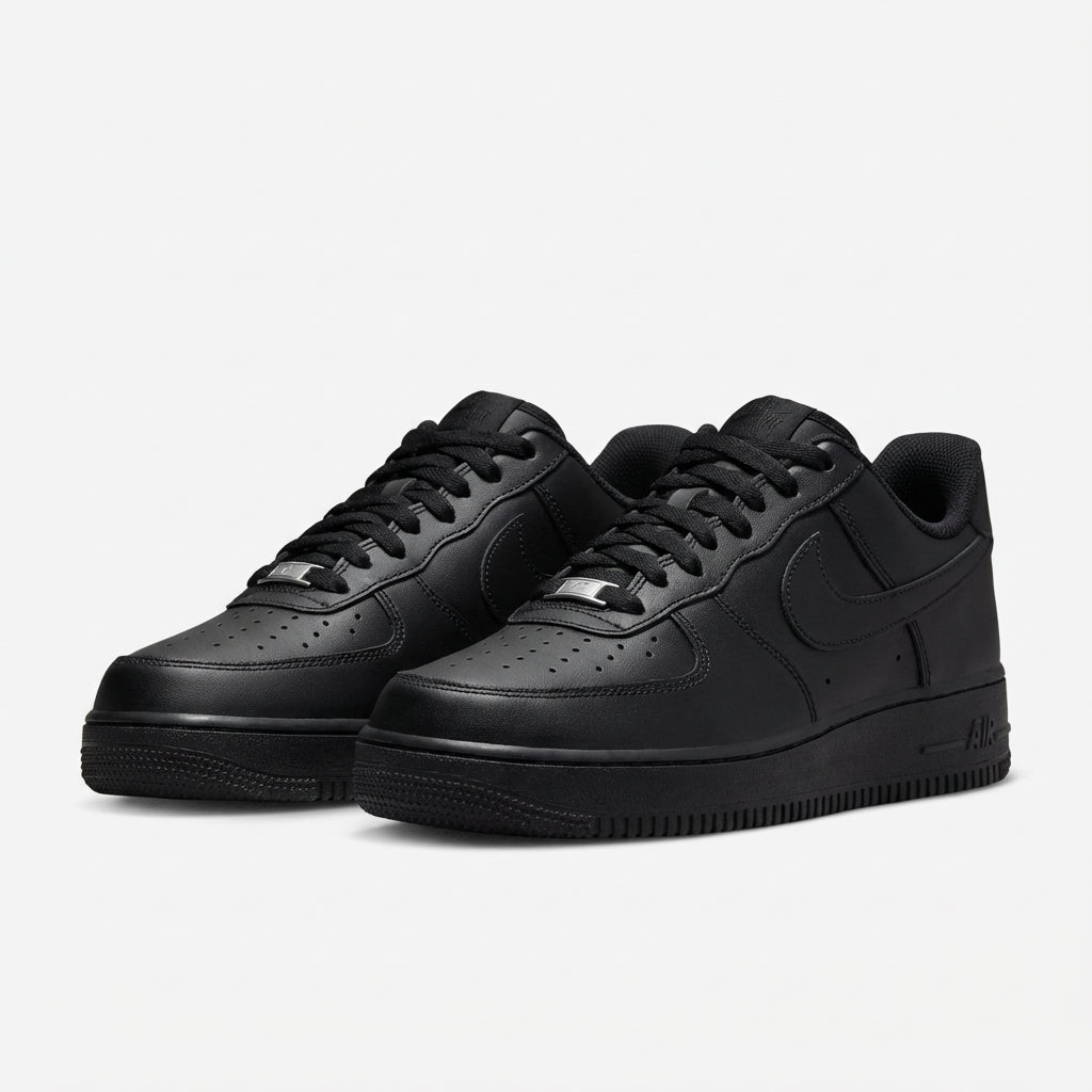 Nike Air Force 1 07 Triple Black sneaker pair front three-quarter view showing perforated toe box and tonal stitching