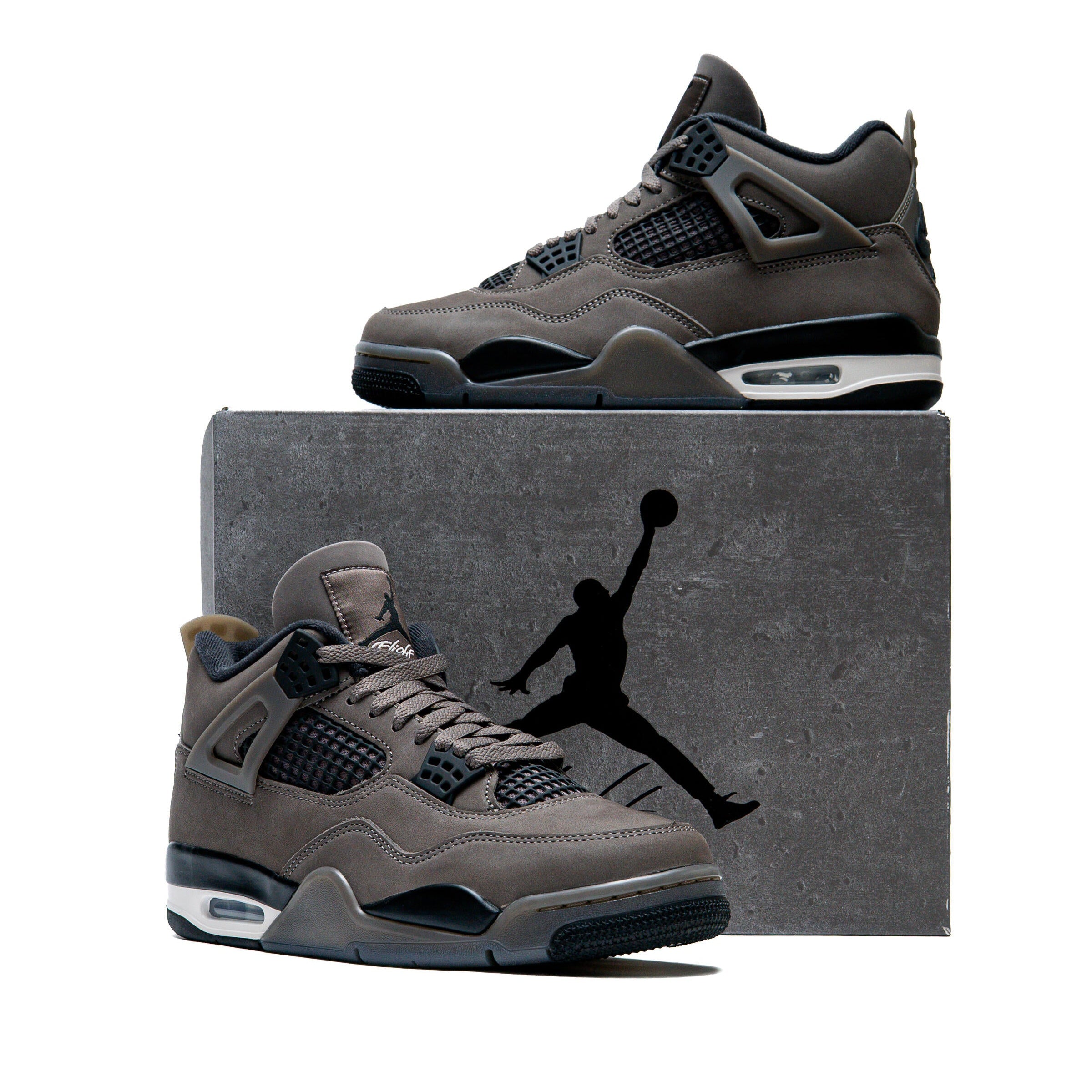 Jordan 4 Retro Cave Stone GS - two shoes displayed with Jordan Brand box showing Jumpman logo, cave stone brown nubuck upper with black accents and white Air-Sole midsole