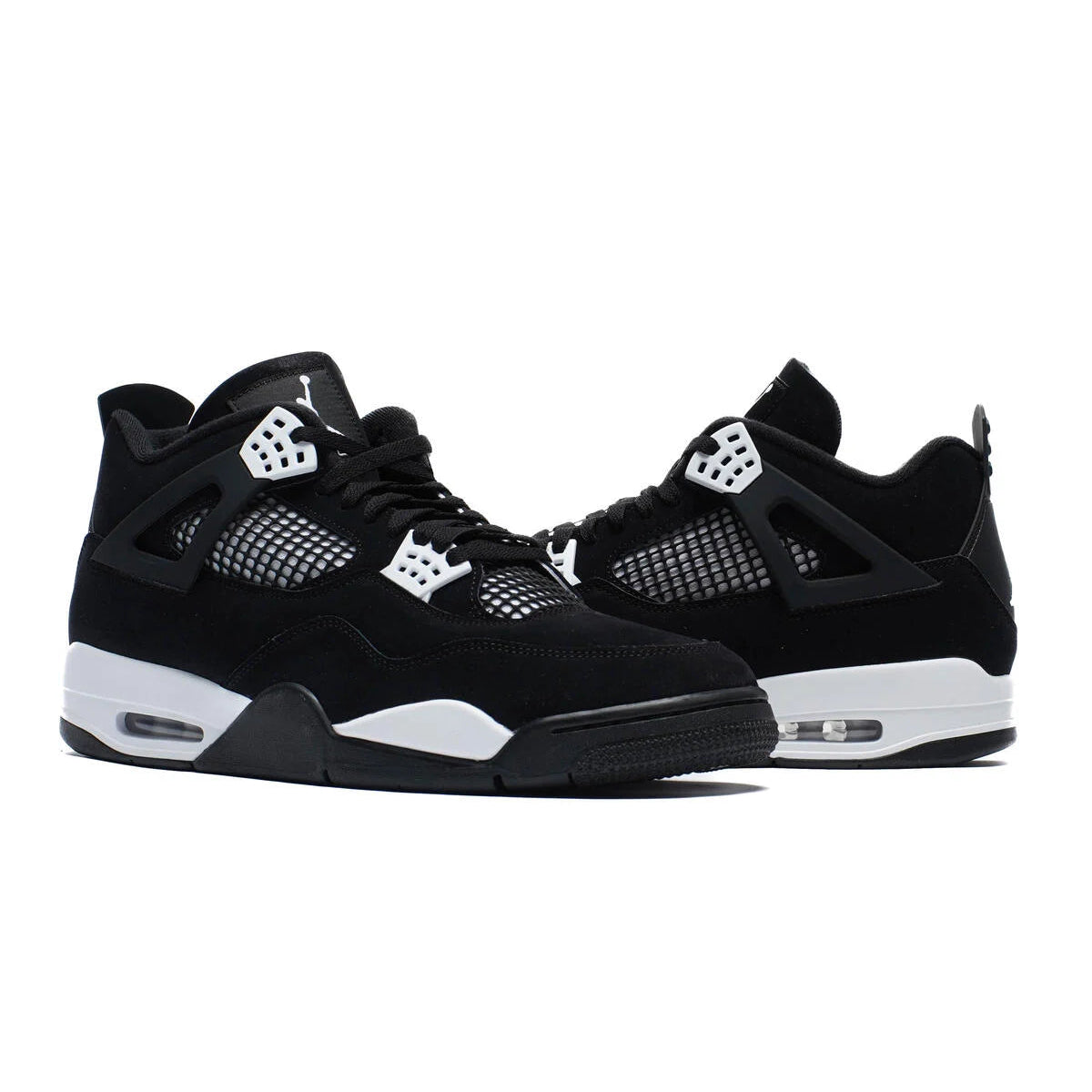 Jordan 4 Retro White Thunder pair front view showing black canvas upper, white lace cage eyelets, black mesh panels, and white midsole with visible Air unit