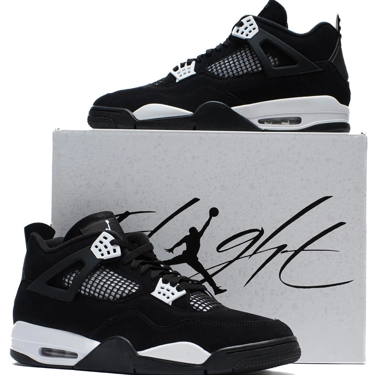 Jordan 4 Retro White Thunder pair displayed with white Jordan Flight box showing black canvas upper, white eyelets, and white midsole accent