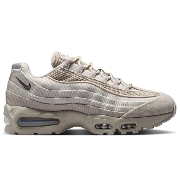 A side view of the Nike Air Max 95 Canvas Cream showing the layered cream upper, tonal neutral panels and visible Air cushioning.