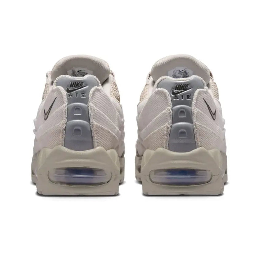 A rear view of the Nike Air Max 95 Canvas Cream showing the layered heel construction and visible Max Air cushioning.