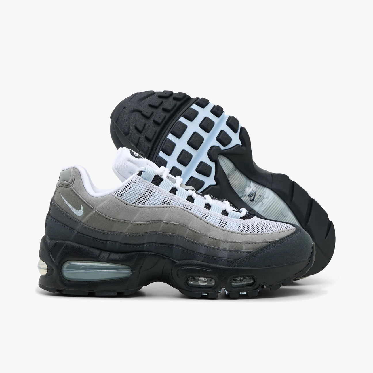 Nike Air Max 95 OG Blue Tint pair stacked showing lateral side, outsole tread and blue tint Air cushioning