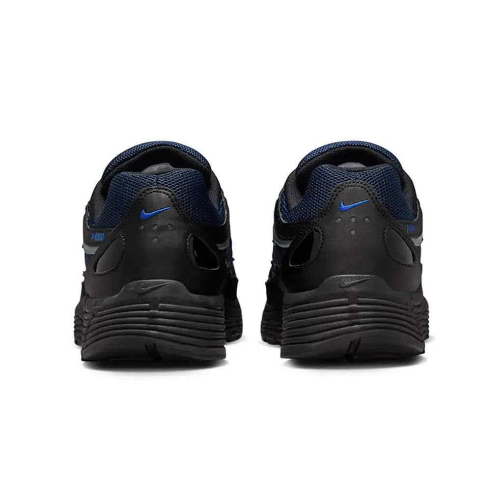 Nike P-6000 Black Obsidian heel view showing blue Swoosh on collar dark navy mesh and black ribbed midsole