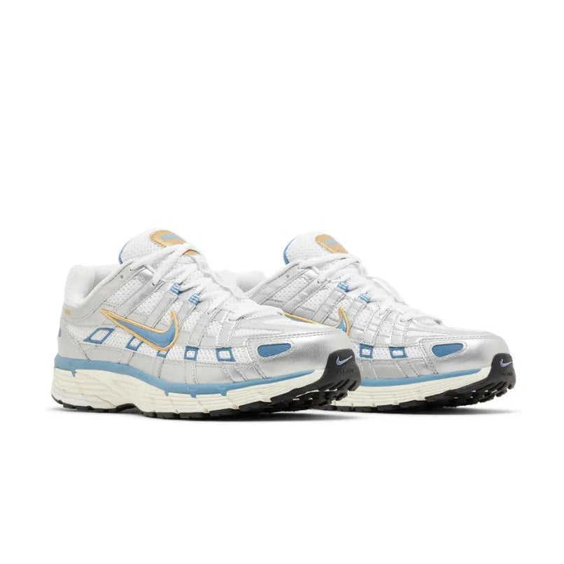 Nike P-6000 Metallic Silver Aegean Storm pair front angled view showing gold tongue branding blue Swoosh and silver panels