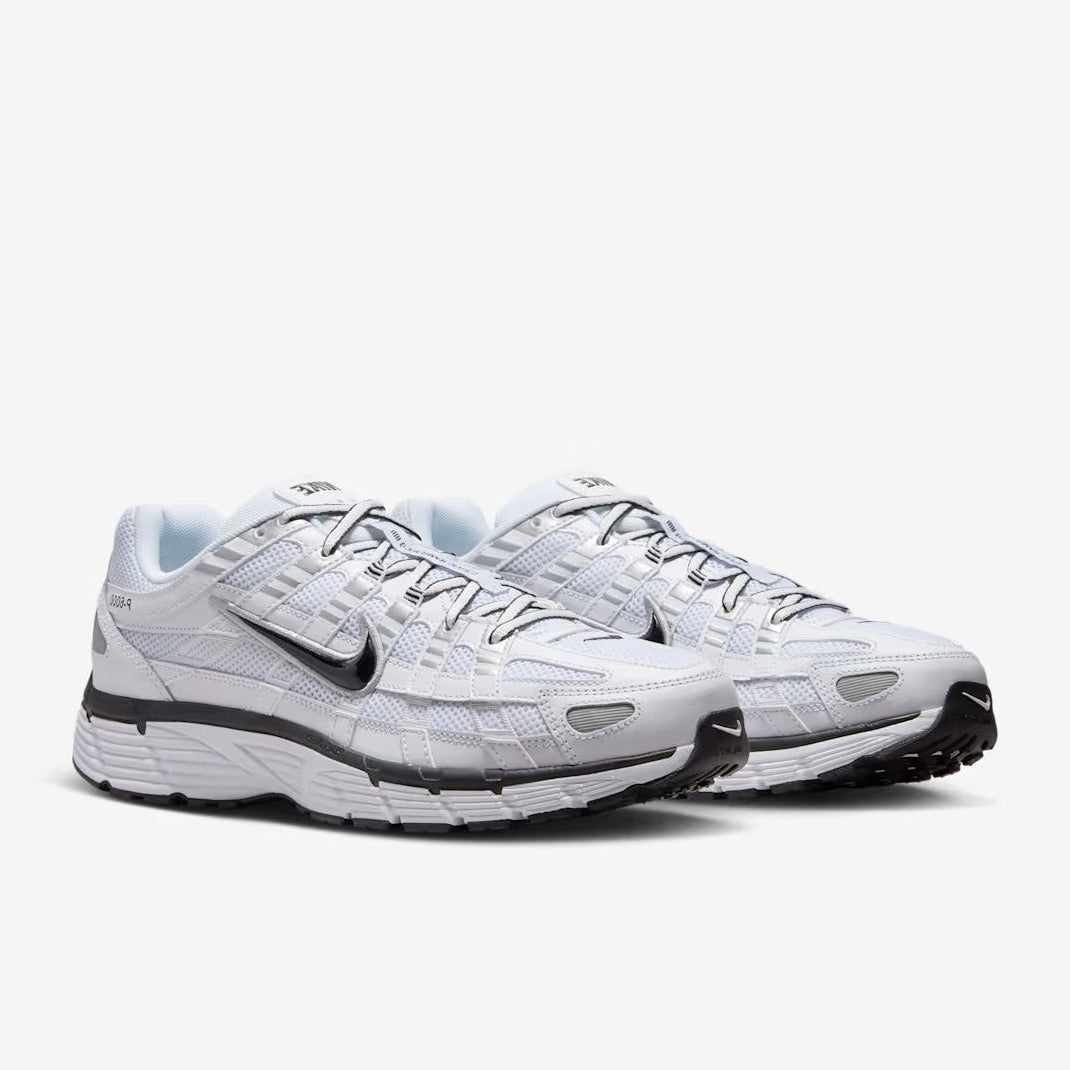 Nike P-6000 White Metallic Silver Black pair front angled view showing chrome Swoosh and silver layered overlays