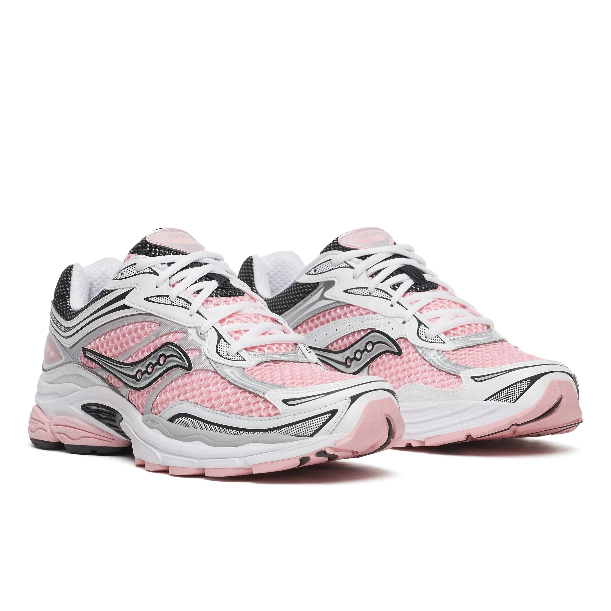 A pair of Saucony ProGrid Omni 9 White Touch trainers featuring soft pink mesh, white and metallic silver overlays, black detailing and a chunky retro running sole on a clean white background.