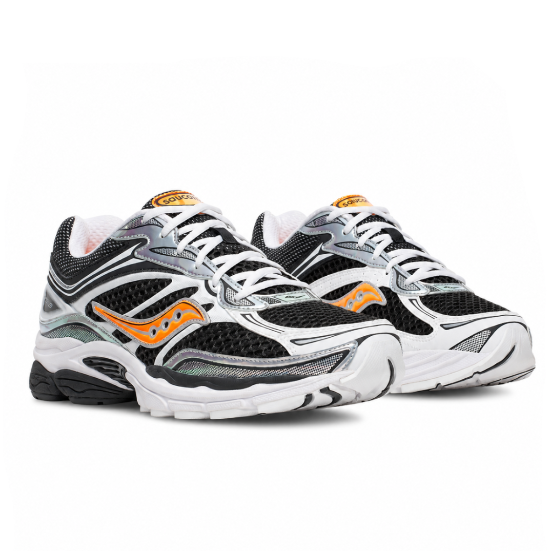 Saucony ProGrid Omni 9 Speed Shades front angle showing black mesh, white overlays, orange detailing and layered retro runner construction
