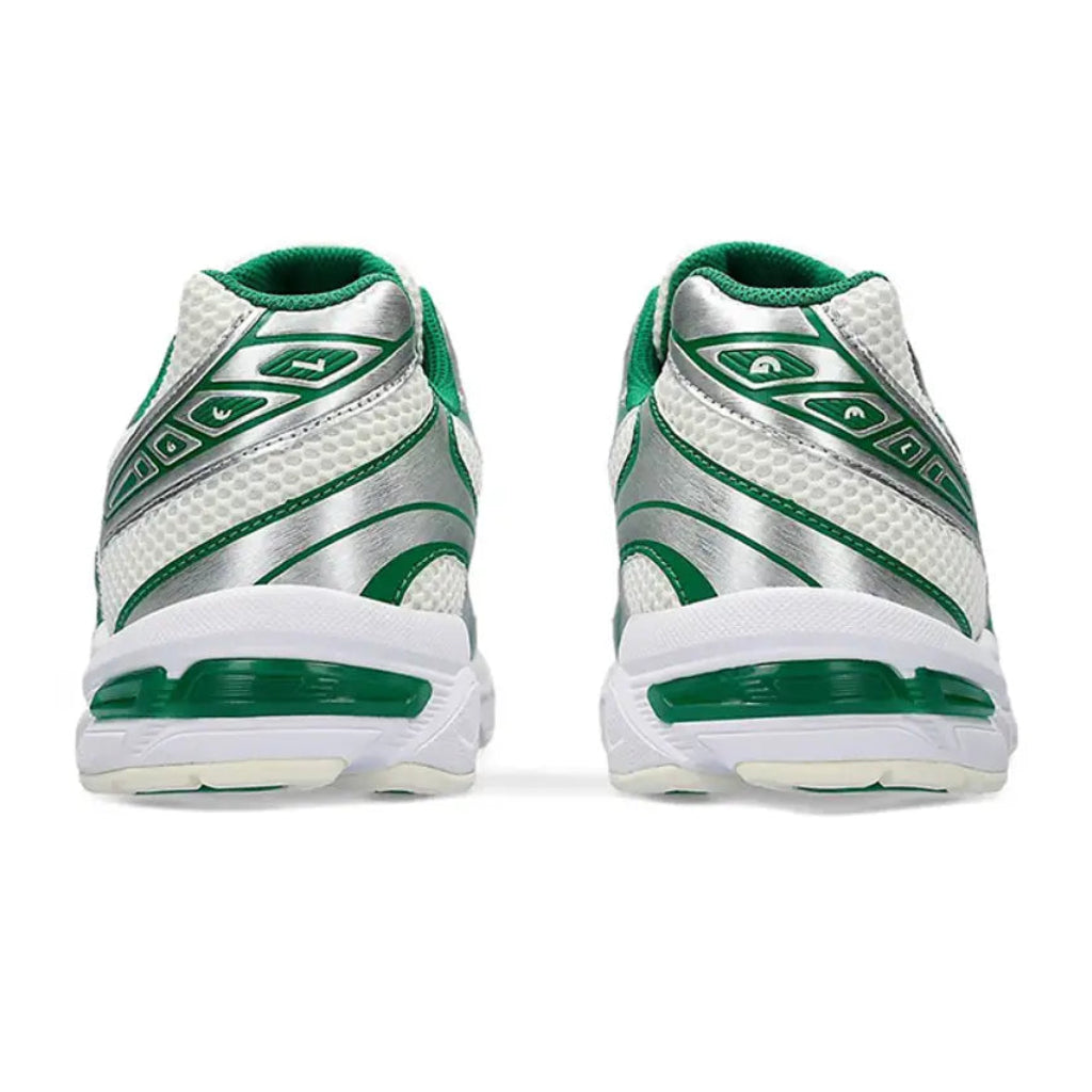 A rear view of the ASICS GEL-1130 Cream Kale trainers, showing the structured heel, cream and muted green colour palette and cushioned sole on a clean white background.