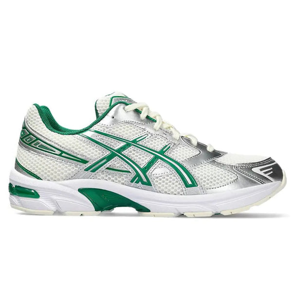 A side view of the ASICS GEL-1130 Cream Kale trainer, showing the cream mesh upper, Kale green detailing, signature ASICS stripes and sculpted cushioned midsole.