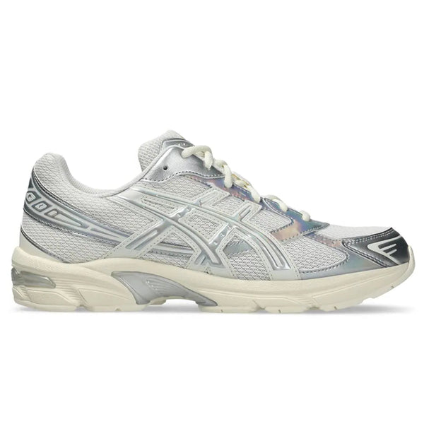 A side view of the ASICS GEL-1130 Holiday Pack Cream Pure Silver trainer, showing the cream mesh upper, reflective Pure Silver detailing, layered ASICS stripes and sculpted cushioned midsole.