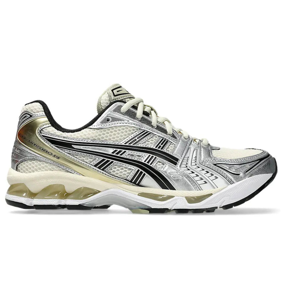 A side view of the ASICS GEL-KAYANO 14 Birch Silver trainer, showing the Birch mesh upper, metallic silver overlays, contrasting black ASICS stripes and technical GEL midsole.