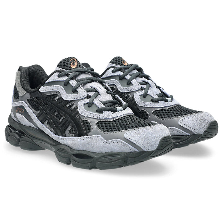 A pair of ASICS GEL-NYC Black Cement Grey trainers featuring a predominantly black upper, Cement Grey overlays, signature ASICS stripes and a sculpted cushioned sole on a clean white background.