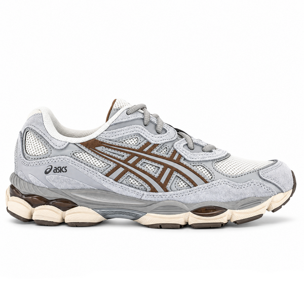 A side view of the ASICS GEL-NYC Cream Cement Grey Brown trainer, showing the cream mesh upper, Cement Grey overlays, warm brown accents and layered ASICS detailing.