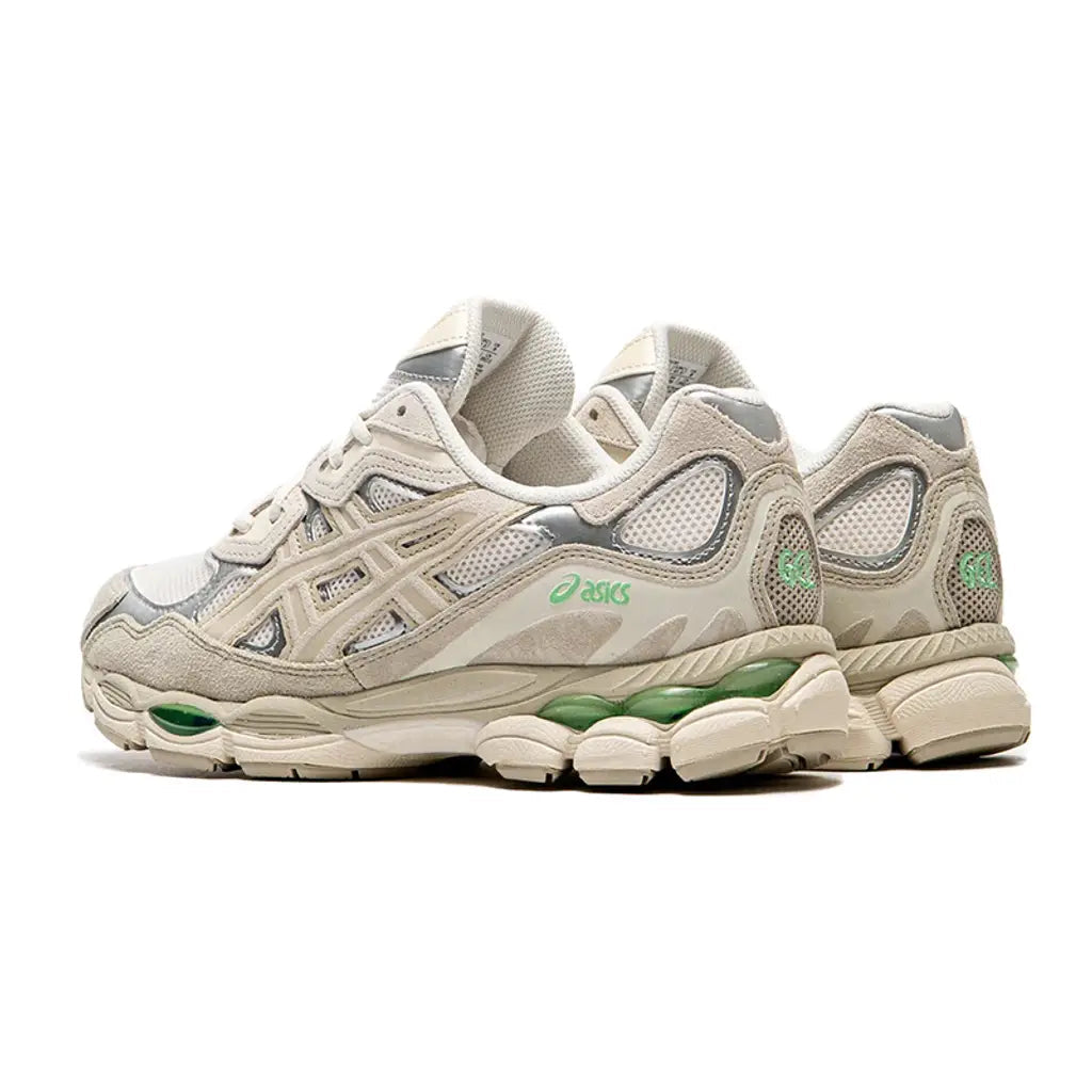 Back heel view of the ASICS GEL-NYC Cream Fossil running shoe, displaying the premium retro detailing, supportive heel structure, and durable traction outsole.