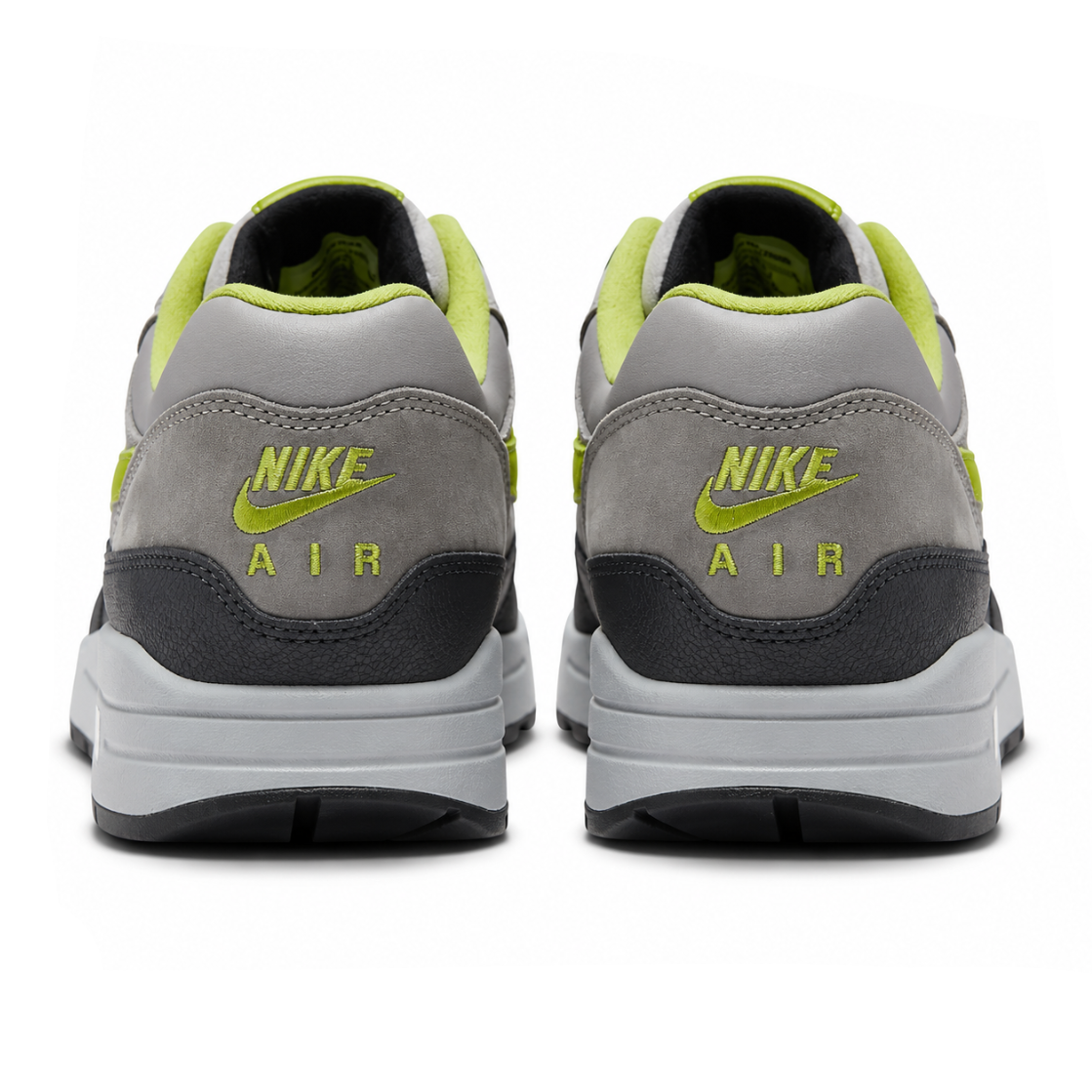 A rear view of the HUF x Nike Air Max 1 Grey Green trainers showing the grey leather heel construction and collaborative detailing.