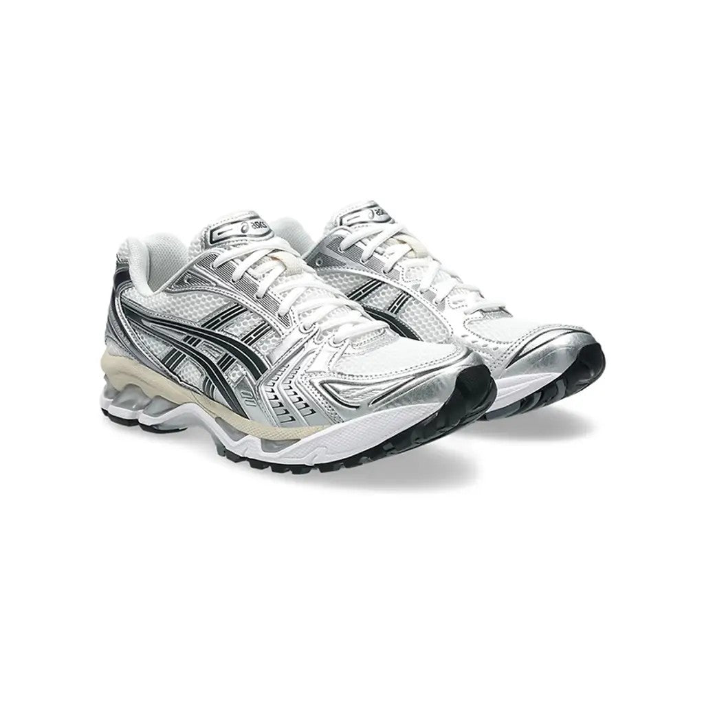 Pair of white and black running shoes on a white background