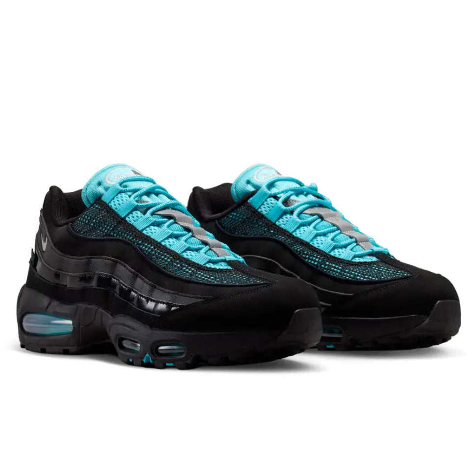 A pair of Nike Air Max 95 Big Bubble SE Scorpion trainers featuring a tonal black layered upper, metallic silver and chrome accents, Gamma Blue detailing and oversized visible Air cushioning on a clean white background.