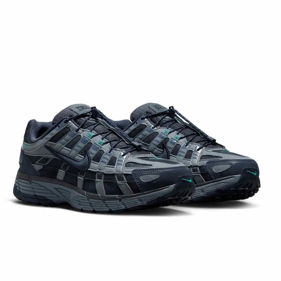 A pair of Nike P-6000 Winterised Thunder Eclipse trainers featuring Thunder Blue textile, Blue Graphite overlays, Clear Jade accents and layered retro running detailing on a clean white background.